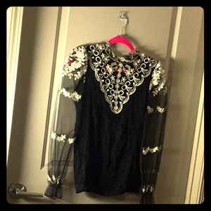 Black lace blouse with gold floral embroidery
